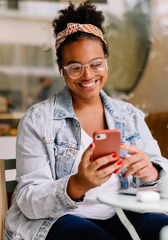 Woman looking at cell phone.