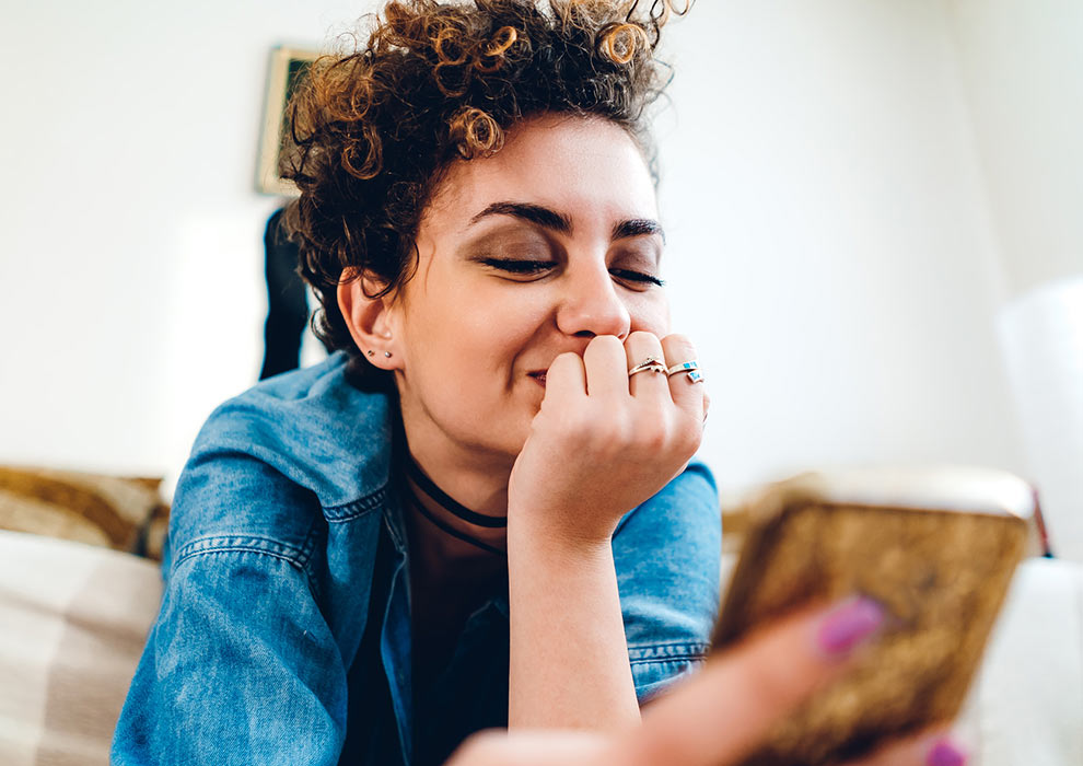 Woman looking at phone.